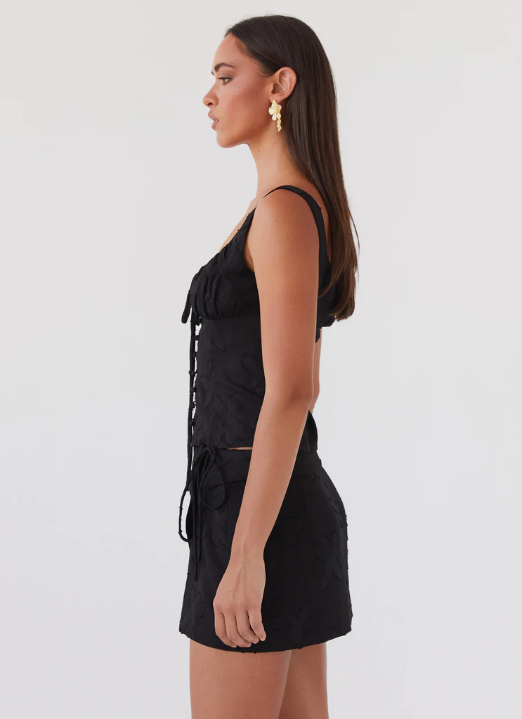 Mini-jupe à ceinture nouée Bianka - Pétale noir