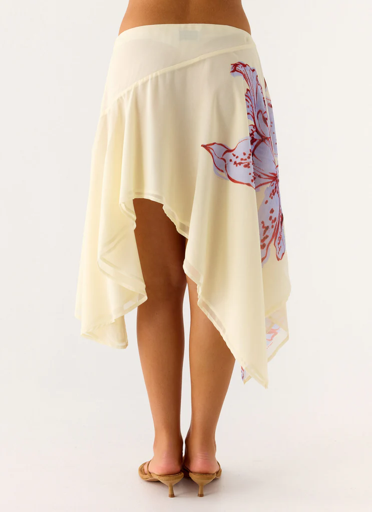 Jupe mi-longue asymétrique à taille basse Kia - Fleurs pourpre